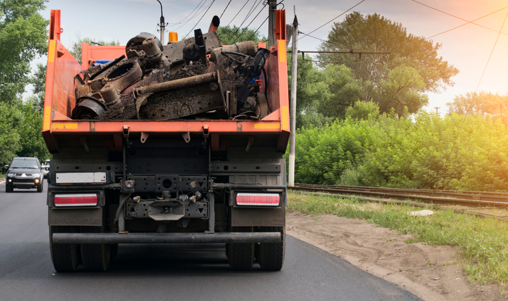 Rear,View,Of,A,Dump,Truck,Loaded,On,The,Road