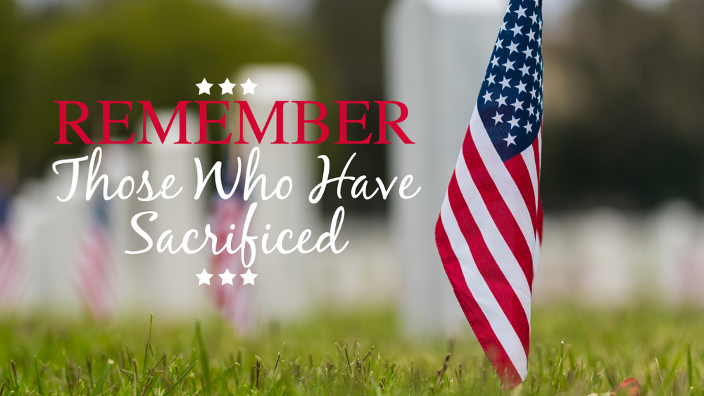 Small,American,Flags,And,Headstones,At,National,Cemetary-,Memorial,Day